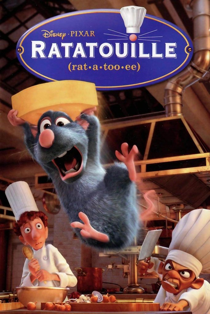 Two chefs and a mouse hold a piece of cheese